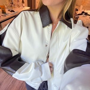 White and brown bomber jacket